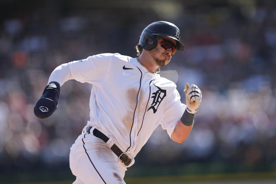 Detroit Tigers' Zach McKinstry rounds third base on his way to score against the Cleveland Guardians in the sixth inning of a baseball game, Saturday, Sept. 30, 2023, in Detroit. (AP Photo/Paul Sancya)