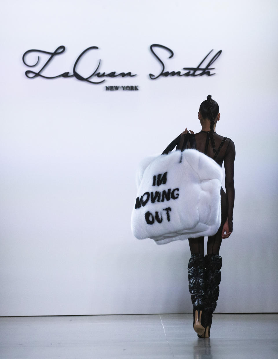 The LaQuan Smith collection is modeled during Fashion Week, Saturday, Feb. 8, 2020, in New York. (AP Photo/Eduardo Munoz Alvarez)