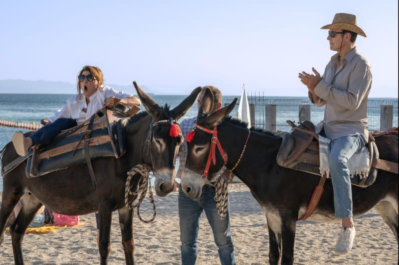 Nia Vardalos and John Corbett get in on the mule riding. Photo courtesy of Focus Features