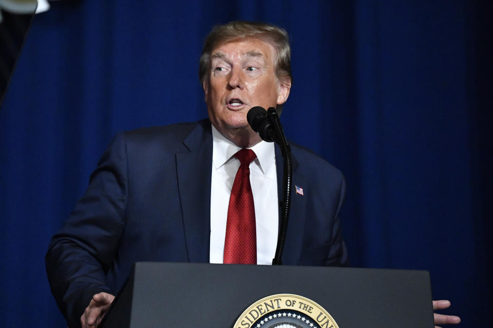 President Donald Trump speaks to the 75th annual AMVETS National Convention in Louisville, Ky., Wednesday, Aug.21, 2019. (AP Photo/Timothy D. Easley)