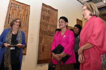 Indonesian's first lady Iriana Widodo (2nd R) and Lucy Turnbull, wife of Australia's Prime Minister Malcolm Turnbull, view Yirrkala bark paintings in the Aboriginal and Torres Strait Islander collection at the Art Gallery of New South Wales in Sydney, Australia, February 26, 2017. REUTERS/Saeed Khan/Pool