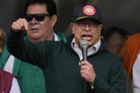 Colombian President Gustavo Petro speaks at the International Workers' Day march in Bogota, Colombia, Wednesday, May 1, 2024. Petro on Wednesday described Israel’s actions in Gaza as “genocide” and announced his government would end diplomatic relations with Israel effective Thursday. (AP Photo/Fernando Vergara)