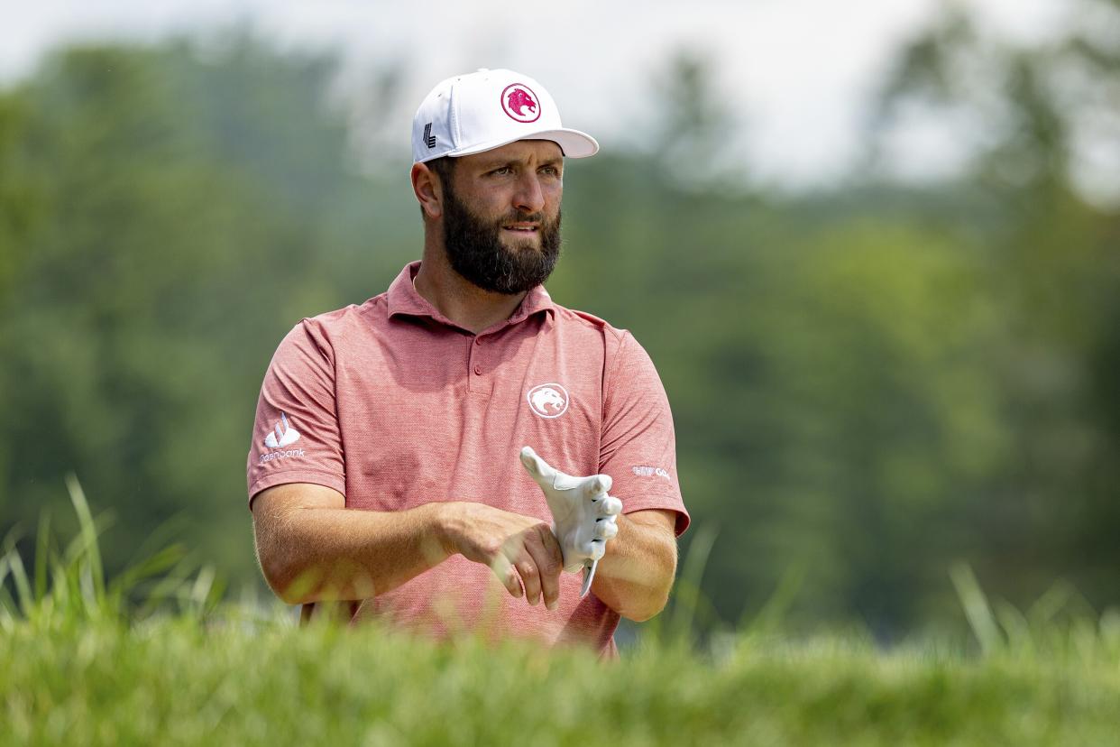 Captain Jon Rahm, of Legion XIII, waits on the 11th hole during the second round of LIV Golf Greenbrier at The Old White at The Greenbrier, Saturday, Aug. 17, 2024, in White Sulphur Springs, W.Va. (Scott Taetsch/LIV Golf via AP)