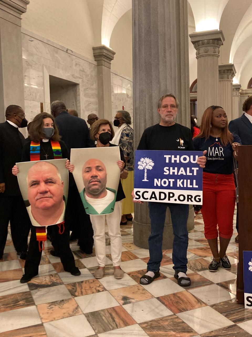 Randy Gardner, brother of Ronnie Lee Gardner, who was executed by firing squad in Utah, stands with opponents of South Carolina's death penalty at the statehouse Wednesday.