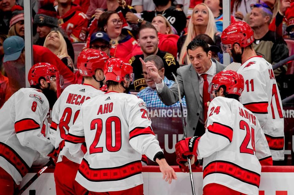 Down 2-0 in the first period, Carolina Hurricanes coach Rod Brind’Amour talks with his team during a time out in Game 4 of the Eastern Conference Finals against the Florida Panthers on Wednesday, May 24, 2023 at FLA Live Arena in Sunrise, Fla.