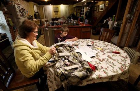 <b class="credit">Julio Cortez/AP </b>Irene Sobolov and her son Joey at the kitchen table of the ground floor living area in Hoboken, N.J., that is being called a "basement"