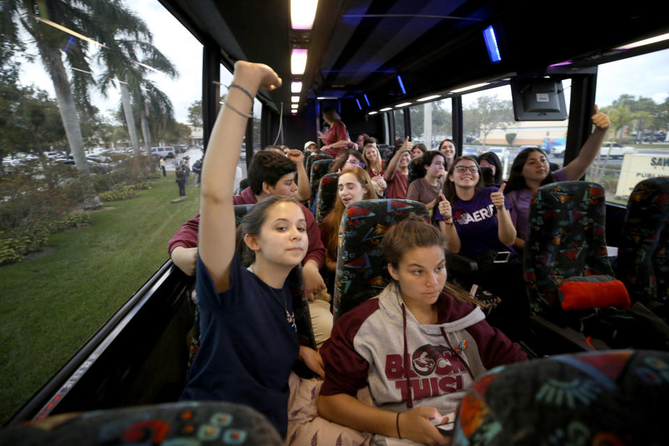 Julia Salomone, 18, and her sister Lindsey Salomone, 15, both students at Marjory Stoneman Douglas, join their classmates in a cheer as they leave Coral Springs, Fla., on a bus headed to Tallahassee, Fla. on Tuesday, Feb. 20, 2018. Students plan to meet Florida legislators on Wednesday to discuss gun control. Photo: Susan Stocker/Sun Sentinel/TNS via Getty Images