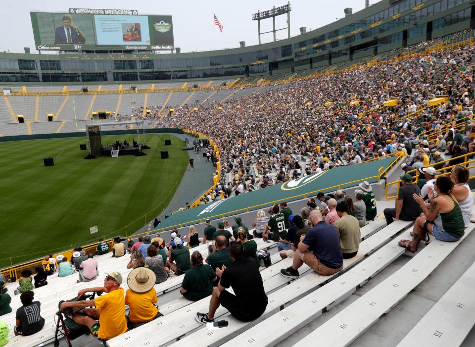 About 7,800 shareholders and guests attend the annual meeting at Lambeau Field on Monday in Green Bay.