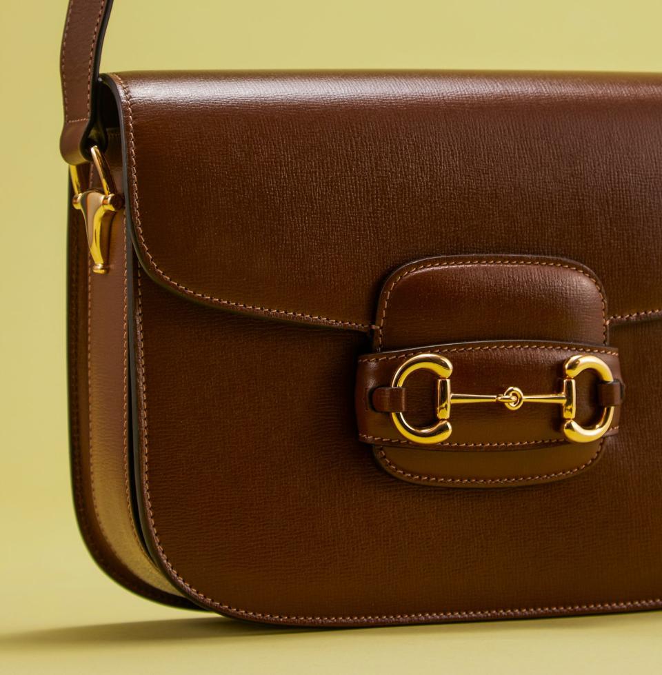 a brown leather purse