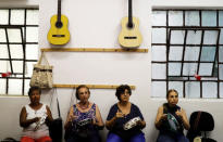 Senior citizens play percussion instruments during a class at Agua Branca park in Sao Paulo, Brazil, February 20, 2019. REUTERS/Nacho Doce