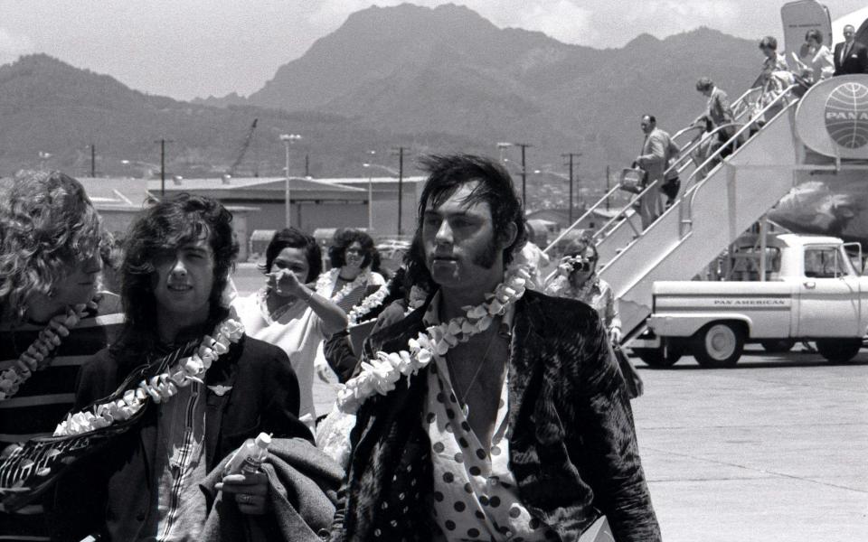 Robert Plant, Jimmy Page and Richard Cole arrive at Honolulu in 1969 - Redferns