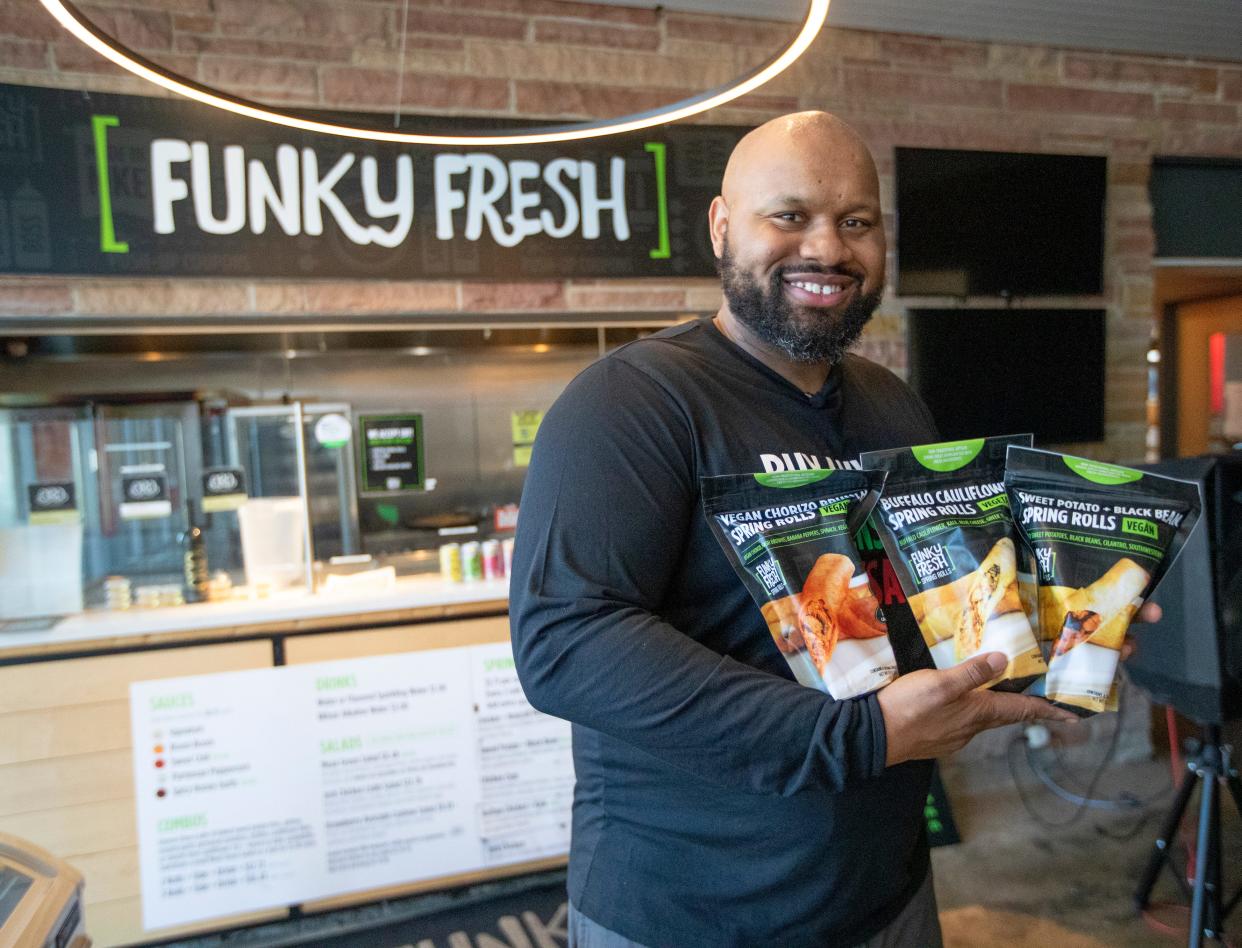 TrueMan McGee, founder of Funky Fresh Spring Rolls, sells freshly baked spring rolls at the Funky Fresh stall at Sherman Phoenix, 3536 W. Fond du Lac Ave., but he branched out to packaged frozen rolls during the pandemic, as more people ate at home. McGee just partnered with Palermo's Pizza to create Funky Villa, a company that will bring wider distribution of the frozen rolls.