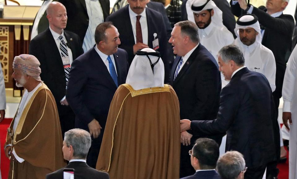 El secretario de Estado de Estados Unidos, Mike Pompeo, y el ministro de Relaciones Exteriores de Turquía, Mevlut Cavusoglu, en Doha