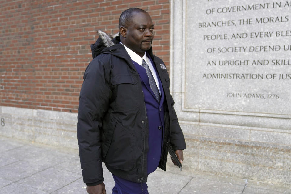 Former Haitian Mayor Jean Morose Viliena departs federal court, Monday, March 20, 2023, in Boston. Viliena, a lawful permanent resident of the U.S. who now lives in Malden, Mass., was sued by three Haitian citizens who say they or their relatives were persecuted by him and his political allies. (AP Photo/Steven Senne)