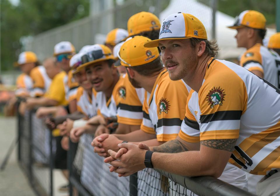 Leesburg's Connor Gleeson (right) watches the action during Friday's home opener against Sanford at Pat Thomas Stadium-Buddy Lowe Field. Gleeson, a native of New Zealand, is spending third summer in a Lightning uniform.