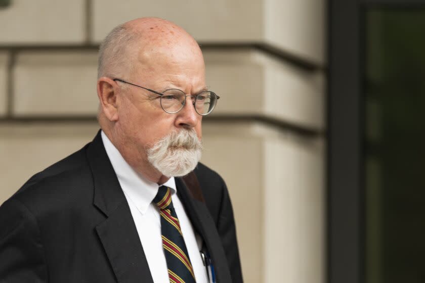 FILE - Special counsel John Durham, the prosecutor appointed to investigate potential government wrongdoing in the early days of the Trump-Russia probe, leaves federal court in Washington, May 16, 2022. Durham ended his four-year investigation into possible FBI misconduct in its probe of ties between Russia and Donald Trump's 2016 presidential campaign. The report Monday, May 15, 2023, from Durham offers withering criticism of the bureau but a meager court record that fell far short of the former president's prediction he would uncover the "crime of the century." (AP Photo/Manuel Balce Ceneta, File)