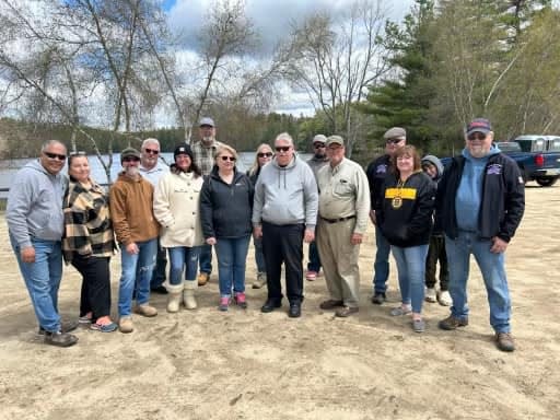 Volunteers pose for group pictures at the conclusion of the Elks Fishing Derby.