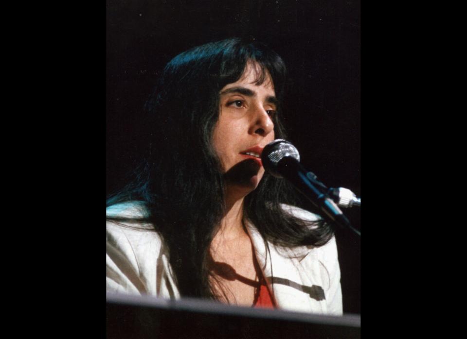 FILE--Laura Nyro is seen in this file photo from June 24, 1988, performing a song in Northhampton, Mass. Nyro, a singer-songwriter, who influenced a generation of women artists with songs like ``Eli's Coming'' and ``Stoned Soul Picnic'' and her intimate blend of pop, folk and jazz, has died at age 49, Tuesday, April 8, 1997, at her home in Danbury, Conn., of ovarian cancer. (AP Photo/Hartford Courant,Roland Otero)