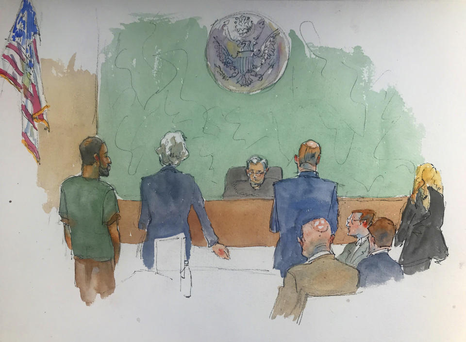 In this courtroom drawing, Najibullah Zazi, left appears at federal court in the Brooklyn borough of New York, Thursday, May 2, 2019, where he was sentenced to ten years in prison for plotting to bomb the New York subway system in 2009. The admitted al-Qaida recruit faced the possibility of life in prison but federal prosecutors say that Zazi provided "extraordinary" assistance to U.S. counterterrorism authorities. The 10-year prison term means Zazi could be released from prison soon. (Aggie Kenny via AP)