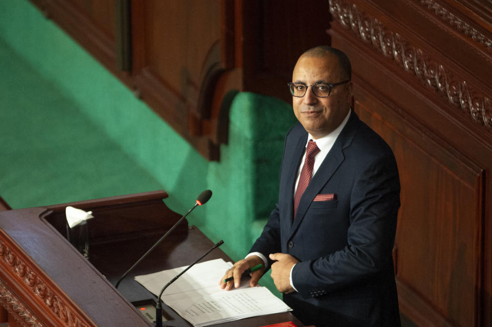 Tunisian designated Prime Minister Hichem Mechichi delivers his speech at the parliament before a confidence vote in Tunis, Tuesday, Sept. 1, 2020. (AP Photo/Riadh Dridi)