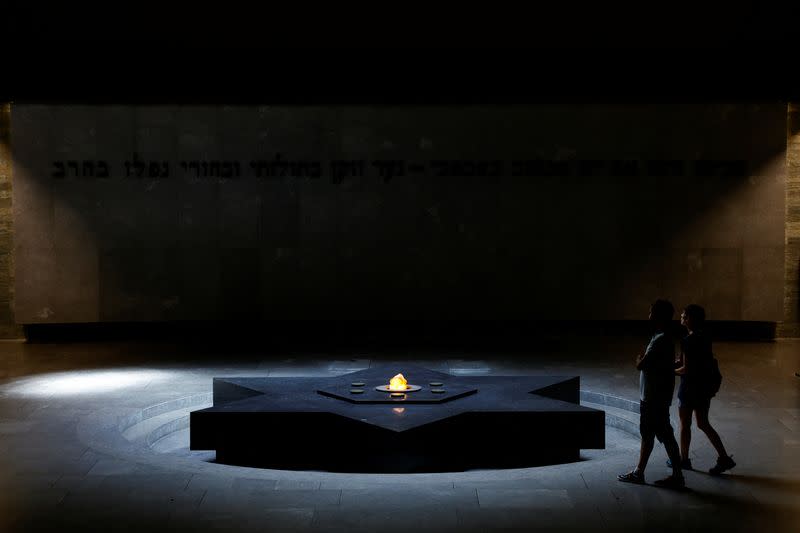 People visit the crypt inside the Shoah Memorial in Paris