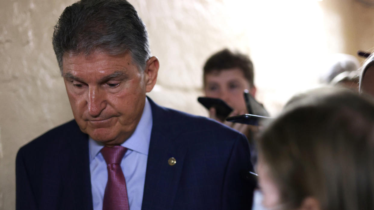 Sen. Joe Manchin, D-W.Va., leaves a meeting Thursday with members of the Texas House Democratic Caucus at the U.S. Capitol.