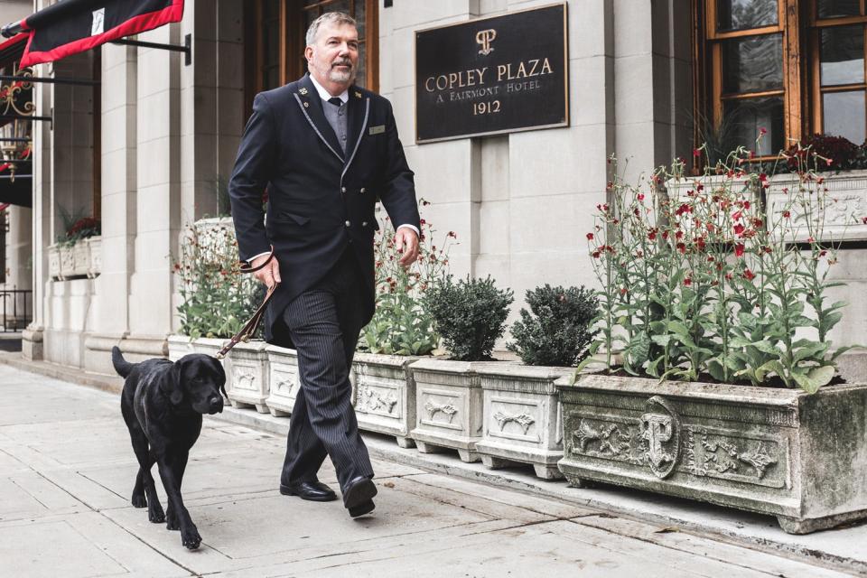 Canine Ambassador Cori Copley and her owner Joe Fallon, who is also the concierge at the Fairmont Copley Plaza.