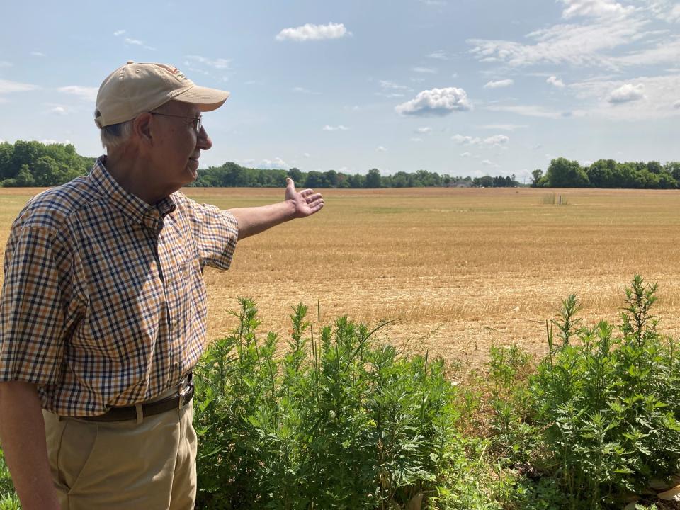 Monmouth County historian John Fabiano points to the field that was once the site of an important Revolutionary War skirmish that may now become a warehouse complex.