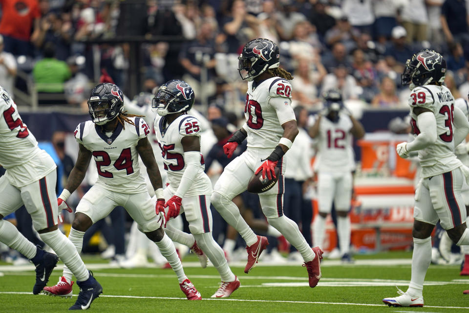 Houston Texans safety Justin Reid (20) celebrates after intercepting a pass against the Jacksonville Jaguars during the first half of an NFL football game Sunday, Sept. 12, 2021, in Houston. (AP Photo/Sam Craft)