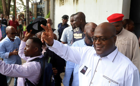 FILE PHOTO: Felix Tshisekedi, leader of the Congolese main opposition party, the Union for Democracy and Social Progress (UDPS), and a presidential candidate, leaves after casting his ballot at a polling station in Kinshasa, Democratic Republic of Congo, December 30, 2018. REUTERS/Kenny Katombe/File Photo