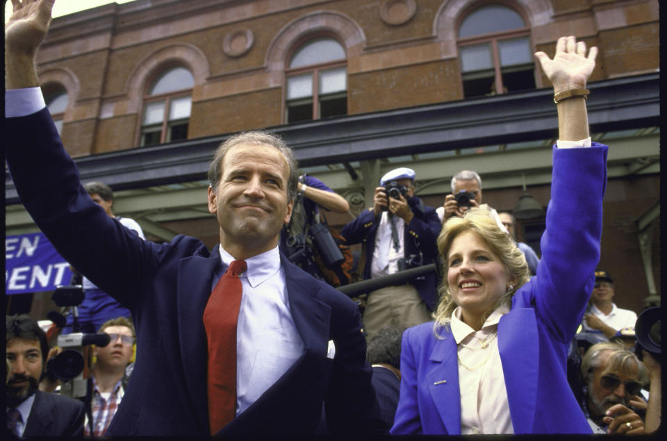 Biden and his wife wave to the crowd after he announced his candidacy for the Democratic presidential nomination on June 1, 1987.