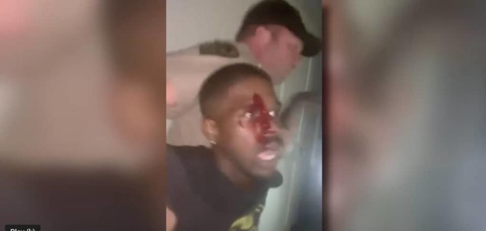 An officer restrains Brandon Calloway in a private Tennessee residence. (ABC24 Memphis YouTube Screenshot)