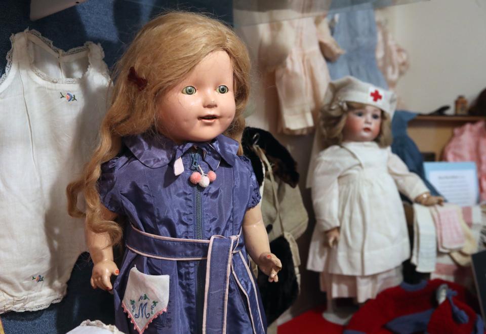 A Horsman doll from the 1930s is on display as part of the new "Wonderful Wardrobes for Treasured Dolls: Stories from Three Families" exhibit at the Doll Museum in Worthington.