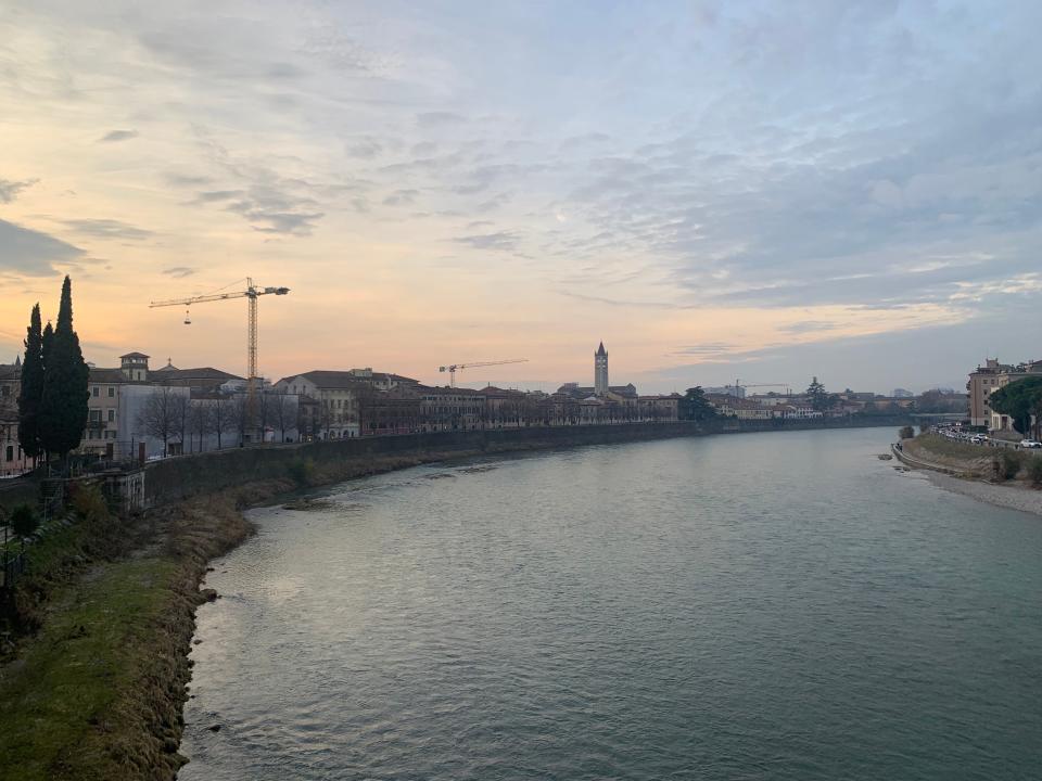 Sunset over river in Verona