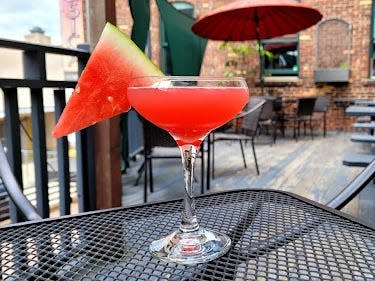 red Daiquiri with slice of watermelon for garnish