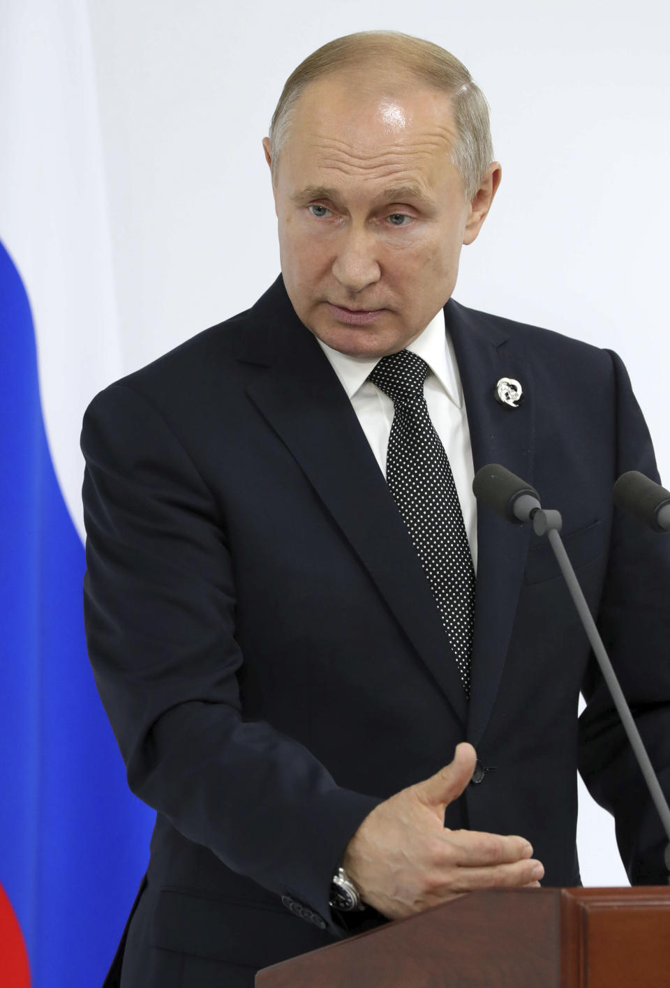 Russian President Vladimir Putin speaks to the media after the G-20 summit in Osaka, western Japan, Saturday, June 29, 2019. (Mikhail Klimentyev, Sputnik, Kremlin Pool Photo via AP)