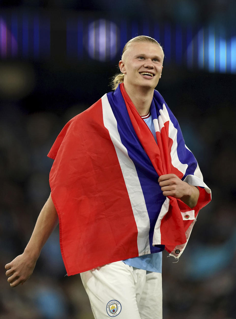 Manchester City's Erling Haaland celebrates at full time after the UEFA Champions League semi-final second leg match against Real Madrid at Etihad Stadium, Manchester. Man City beat Real Madrid 4-0 to advance to Champions League final. (Martin Rickett/PA via AP)