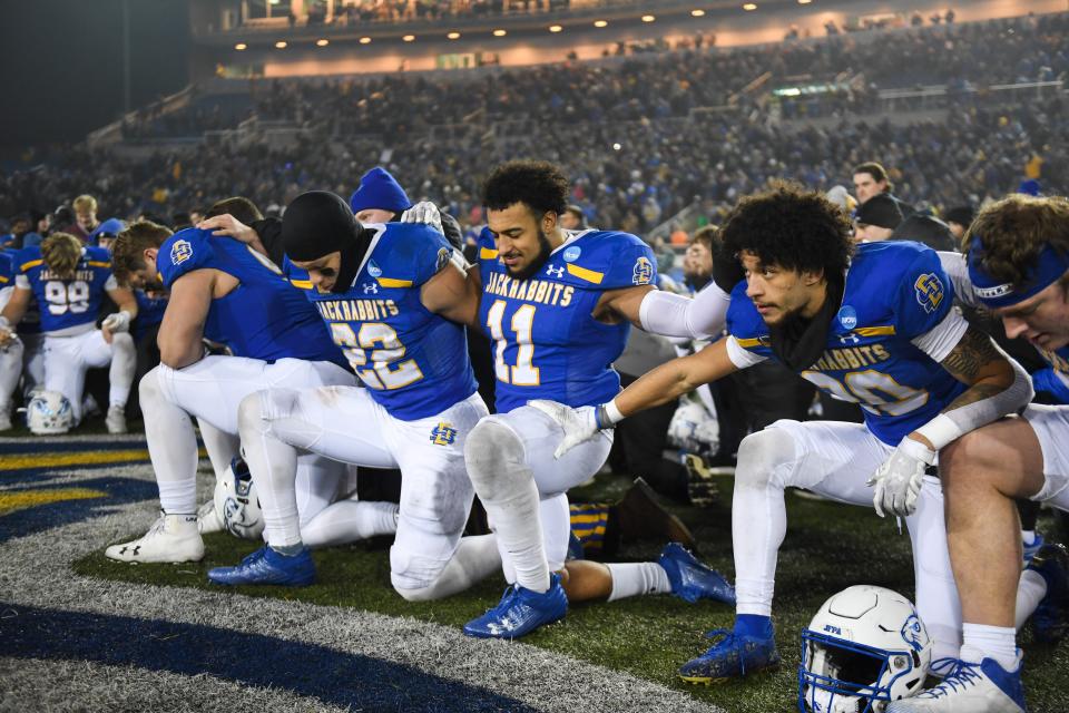 South Dakota State players react after December's FCS semifinal win over UAlbany.