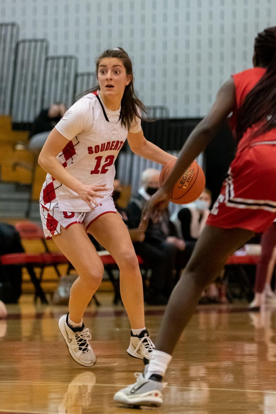 Souderton's Casey Harter looks for an opening in a PIAA 6A first round state playoff game against Easton, on Tuesday, March 8, 2022, at Souderton High School. The Red Rovers defeated Big Red 42-36 to advance to the second round.