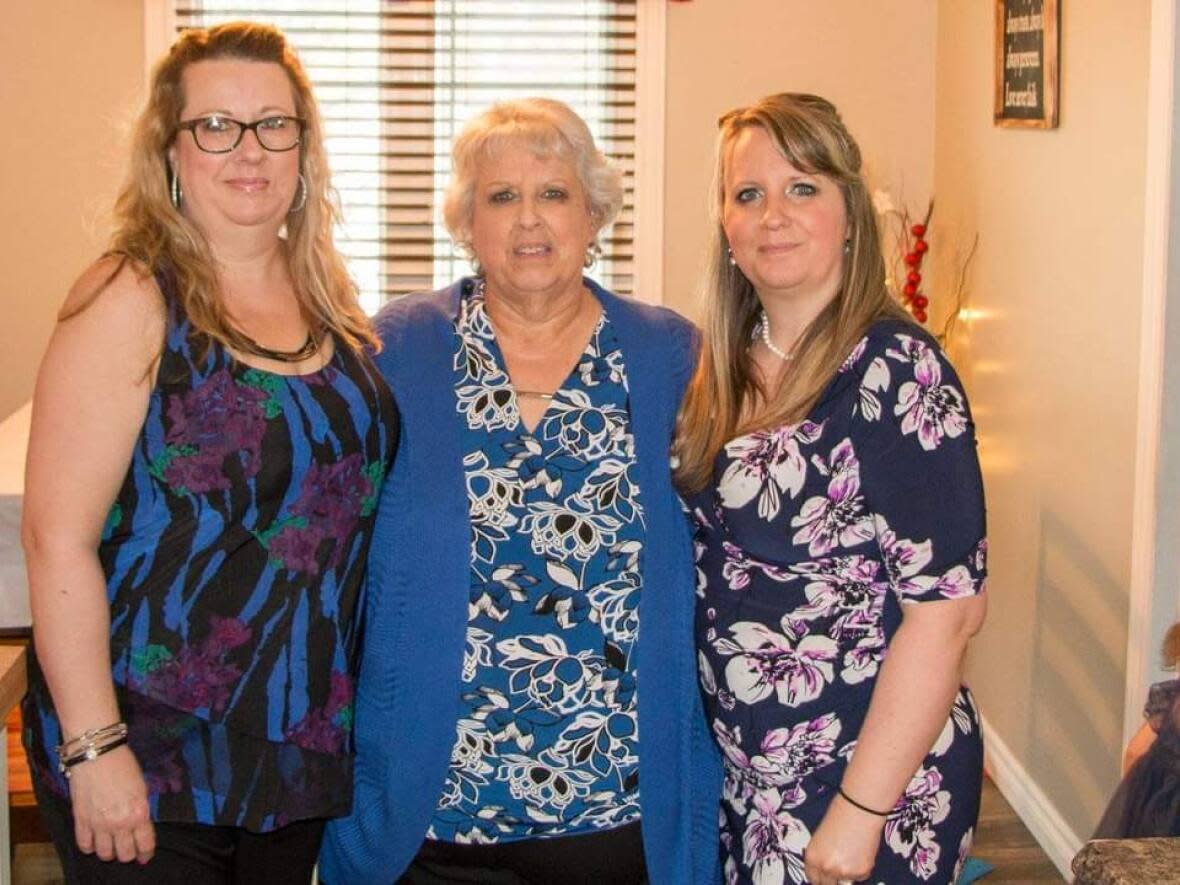 April Hallikas, right, is pictured with her sister Lori Anne Sparkes and her mother Edith Goulding. Goulding died of cancer in November 2020. Sparkes died of cancer in October 2021. (Submitted by April Hallikas - image credit)