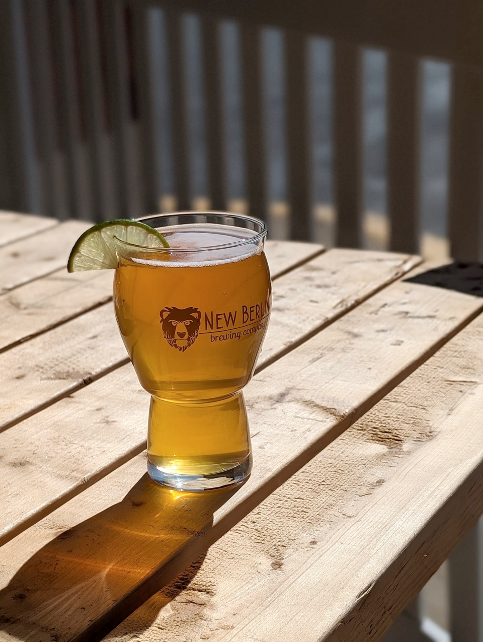 Enjoy one of New Berlin Brewing Company's craft beers outside on a beautiful Ohio summer day.