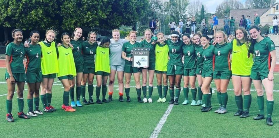 The Thacher School girls soccer team poses with the runner-up plaque after losing to Bishop Diego 6-5 in overtime in the CIF-SS Division 7 final at St. Bonaventure High on Saturday.