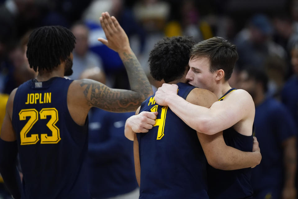 Marquette's Tyler Kolek, from right, Stevie Mitchell and David Joplin celebrate after an NCAA college basketball game against Villanova, Tuesday, Jan. 30, 2024, in Villanova, Pa. (AP Photo/Matt Slocum)