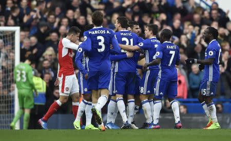 Britain Football Soccer - Chelsea v Arsenal - Premier League - Stamford Bridge - 4/2/17 Chelsea's Cesc Fabregas celebrates scoring their third goal with team mates Reuters / Hannah McKay Livepic