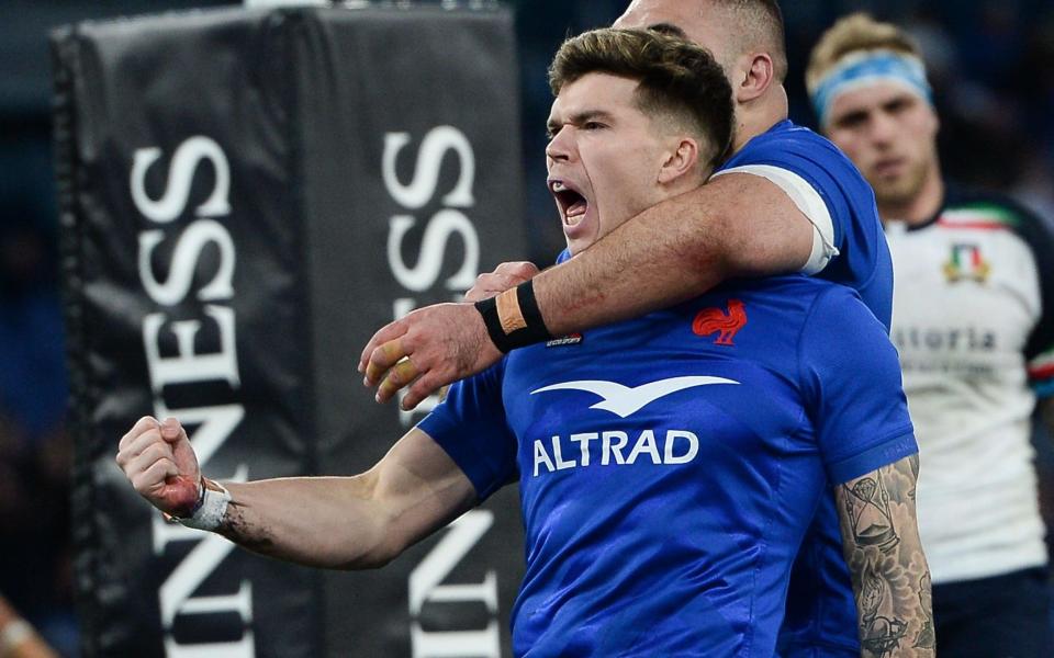 Matthieu Jalibert of France celebrates after scoring a try during the Six Nations Rugby match between Italy and France - France survive almighty Six Nations scare to edge Italy - Silvia Lore/Getty Images