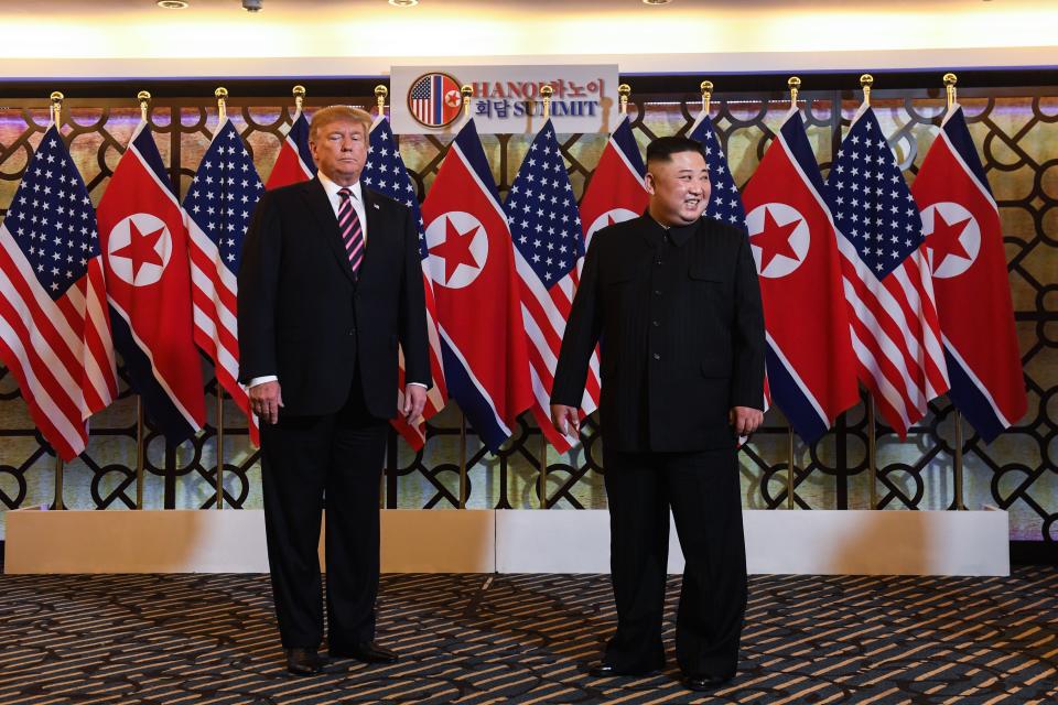 US President Donald Trump (L) and North Korea’s leader Kim Jong Un arrive for a meeting at the Sofitel Legend Metropole hotel in Hanoi (SAUL LOEB/AFP/Getty Images)