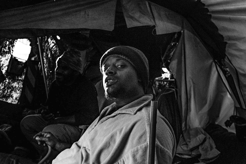 In this undated photo provided by Eric Elmore, Roosevelt White III poses for a photograph in Phoenix. Elmore documented Phoenix’s homeless people in addition to White, who was 36 when he died of a stroke in September after falling ill in the Phoenix homeless encampment known as “The Zone.” Roosevelt is among thousands of homeless people who died this year and are being remembered at winter solstice events for Homeless Persons’ Memorial Day. (Eric Elmore via AP)