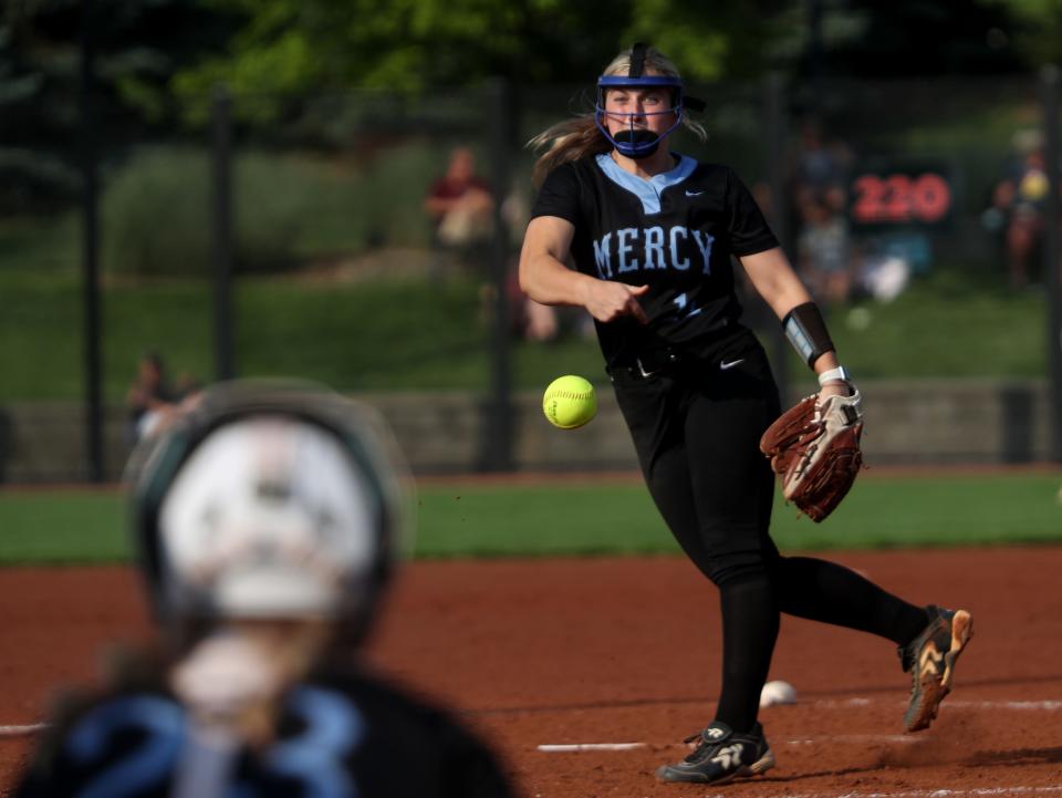 Mercy’s Maya Merrill throws the ball home against Butler in the 6th Region Championship.May 23, 2023