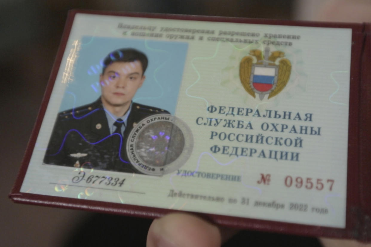 This photo provided by the Dossier Center shows the Russian Federal Protective Service (FSO) identification card of Gleb Karakulov, in October 2022 in Turkey. As an engineer in a field unit of the presidential communications department of the FSO, Karakulov was responsible for setting up secure communications for the Russian president and prime minister wherever they went. (Dossier Center via AP)