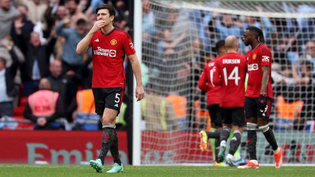  Harry Maguire of Manchester United looks dejected